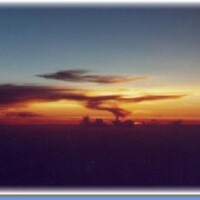 72.Zonsondergang boven de wolken